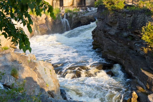 Fast flowing water in rocky rapids.