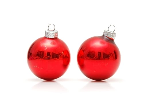 Two christmas balls isolated on white