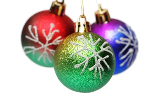 Three Christmas balls hanging - isolated on white