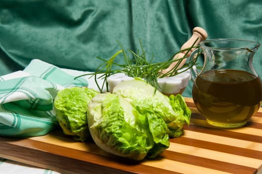 fresh salad on wooden cutting board bamboo