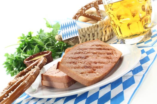 a pretzel with meatloaf and parsley