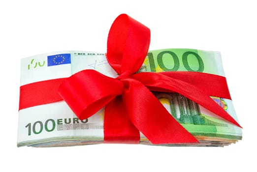 A stack of euro bills decorated with a red ribbon as a gift,isolated on white