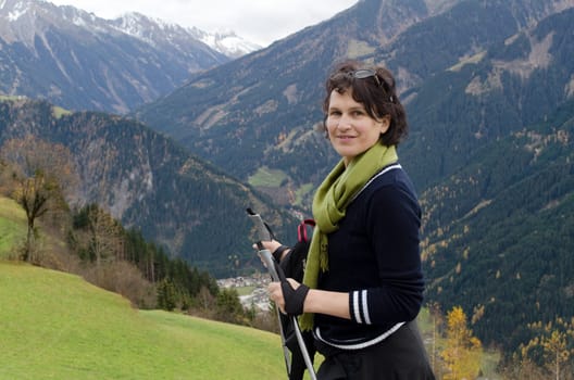 Attractive woman hiking in the mountains
