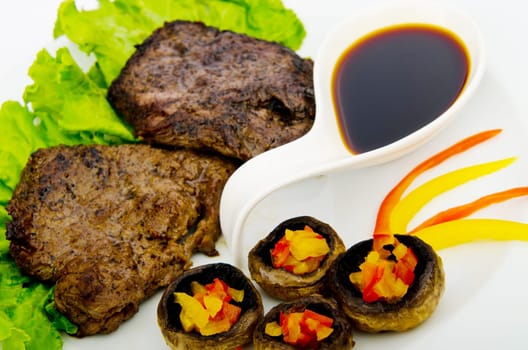Steak with sauce in the plate