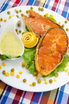 Roasted salmon in the plate