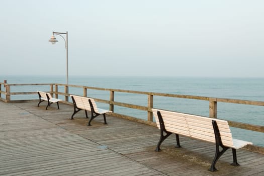 Three benches on the pier of Göhren