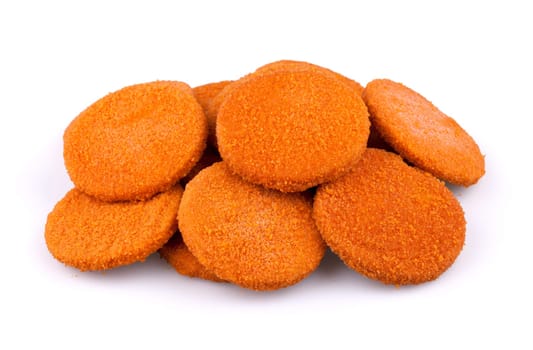 Pile of fishcake burgers isolated on white background.