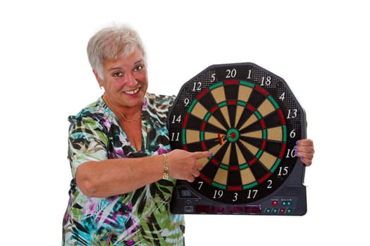 Senior woman with dartboard - isolated on white background