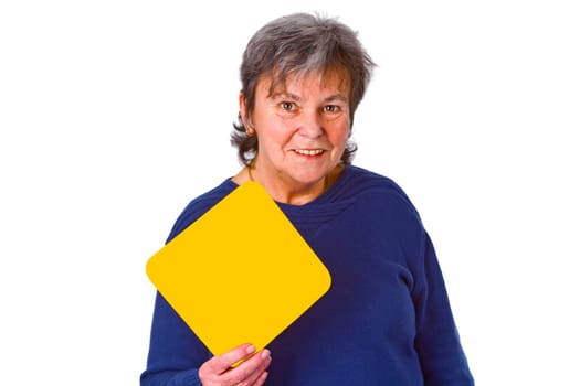 Female senior holding yellow sign - isolated on white background