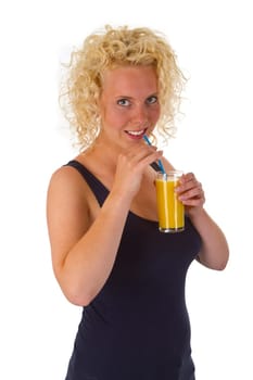 Young woman drinking orange juice isolated on white background