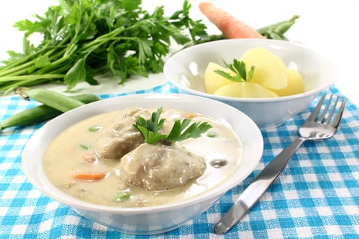 Königsberger meatballs with capers,peas and carrots