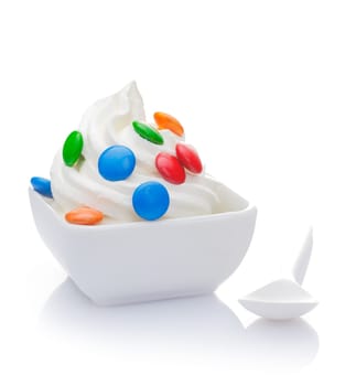 Delicious vanilla frozen Yogurt with smarties topping