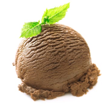 Closeup of a delicious rich chocolate icecream ball garnished with mint on white