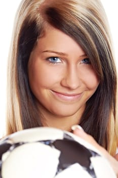 blonde woman playing football