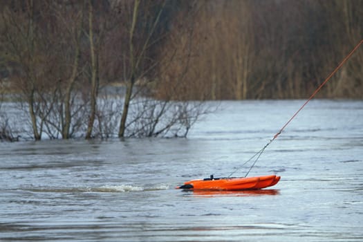Measuring boat on the Weser at high tide
