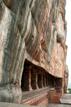 Cave temple cut under gigantic rock at Badami, Karnataka, India, Asia