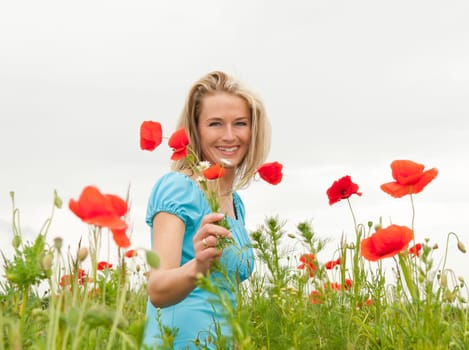 Young woman with bouquet of flowers