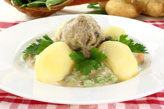 Königsberger meatballs with capers,peas and carrots