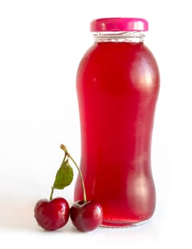Bottle with cherry juice on white background