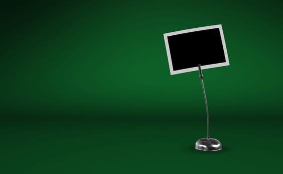 Photo clip silver against green background 2