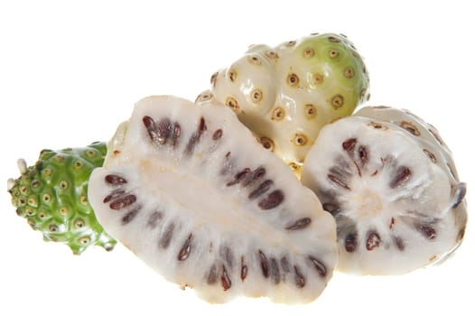 morinda citrifolia fruit on a white background