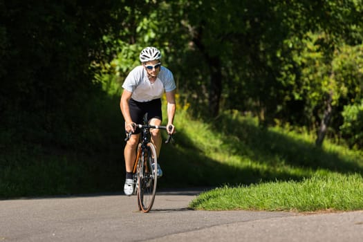Road cyclists pedaling out of the saddle
