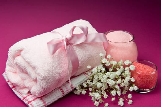 scented products for body care on colored background