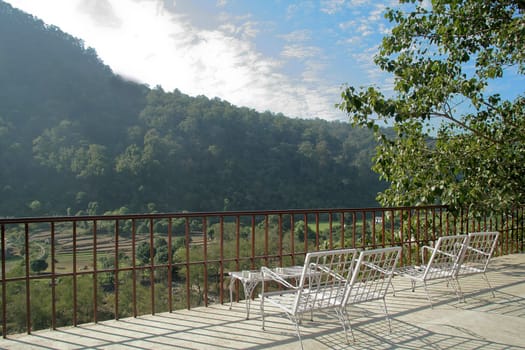 White metal chairs to view and enjoy surrounding natural beauty