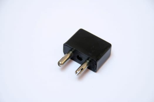 Plug pin end of electrical connection isolated on white