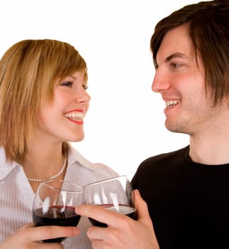 A young couple are having red wine