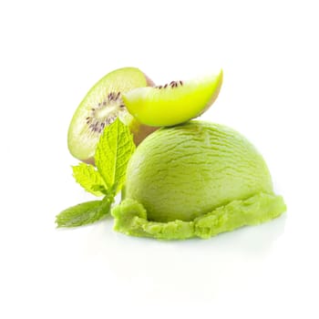 Tropical kiwi icecream dessert with delicious creamy green ice-cream served wioth fresh sliced kiwi fruit garnished with mint