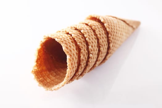 Riffled ice-cream cones on white background, for parlor food concepts