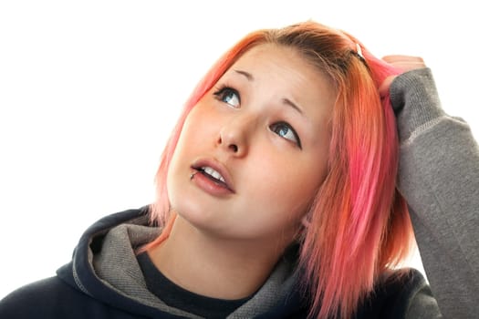Looking up,teenager with red hair against white background