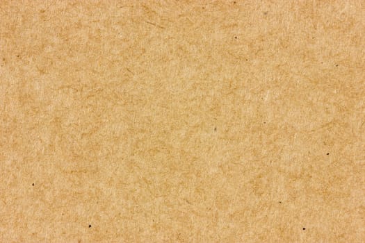 Close-up of brown cardboard. May be used as a background