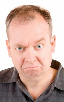 This is a portrait of a grumpy middle aged man.