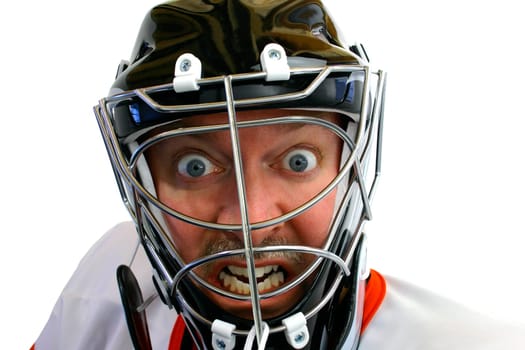 This is a face close-up of a mad hockey goalie.