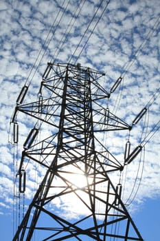 Electrical power pylon with dramatic background clouds