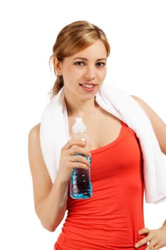 Smiling sportswoman with a bottle of water and a towel against a white background