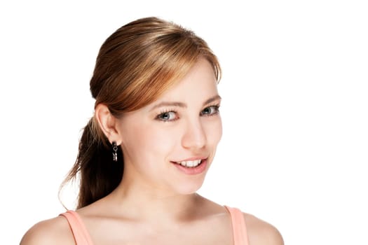 Portrait of a beautiful blonde smiling woman against a white background