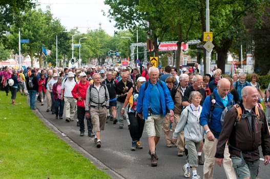 The worlds largest annual walking event with this year over 40,000 participants. The people can choose to walk four days 30, 40 or 50 kilometers  soldiers walk 40km (with 10kg luggage) or 50km without.