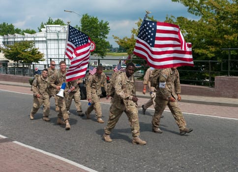 The worlds largest annual walking event with this year over 40,000 participants. The people can choose to walk four days 30, 40 or 50 kilometers  soldiers walk 40km (with 10kg luggage) or 50km without.