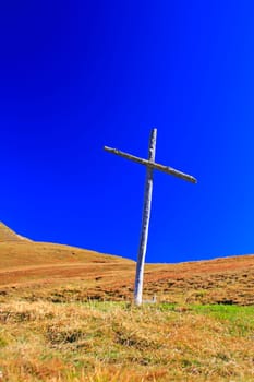 Wooden cross at the Sella Pass (2240m) in the Dolomites,South Tyrol,Italy