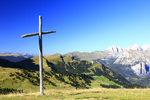 Wooden cross at the Sella Pass (2240m) in the Dolomites,South Tyrol,Italy