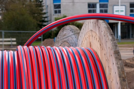 cable drum with red cable on it