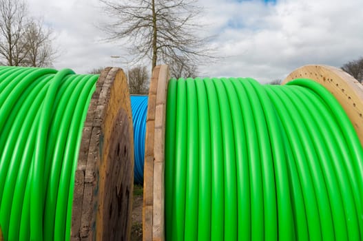 cable drum with green cable on it