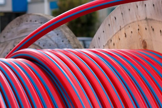 cable drum with red cable on it
