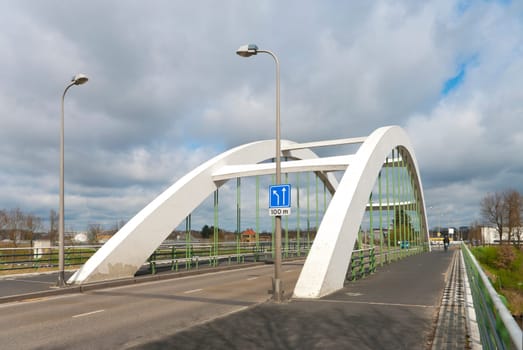 concrete white arch bridge in Enschede, Netherlands