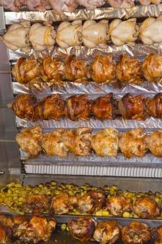 Barbecue chicken on a farmer&#039 s market. Provence, France)