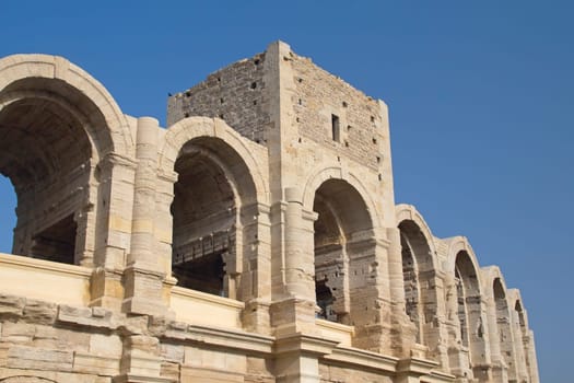 View of the antique amphitheater and arena of Arles in South France (Provence). Horizontally.