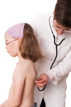 Toddler at pediatrician in front of white background